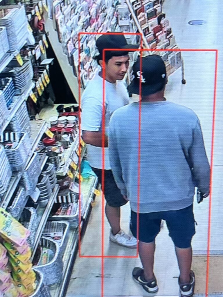 Video surveillance of two persons of interest in theft investigation.
