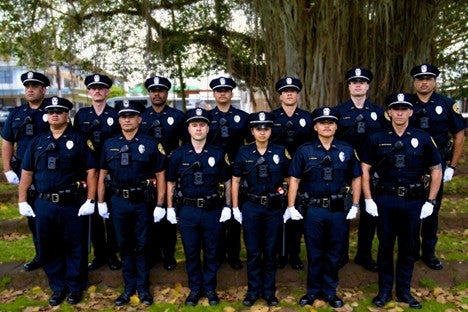 13 police officer graduates of the 104th recruit class.  