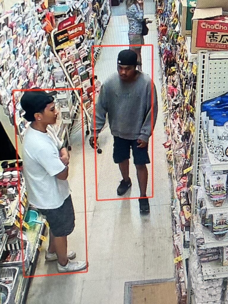Video surveillance of two persons of interest in theft investigation.
