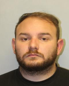 26-year-old Kyle M. J. Benevides, of Pāhoa who was arrested adn charged in connection with a firearm incident that occurred early Friday morning, May 30, 2025, in the area of the 1500 block on Kamehameha Avenue in Hilo.