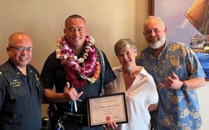 Picture from left to right: Captain Roy Valera, Officer Travis Wong, Tammy Laflamme (Fairmont Orchid), and Kainoa Stafford (Waikoloa Marriott).