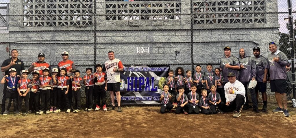 Two baseball teams from the HI-PAL Tee Ball/Coach Pitch Baseball Tournament.