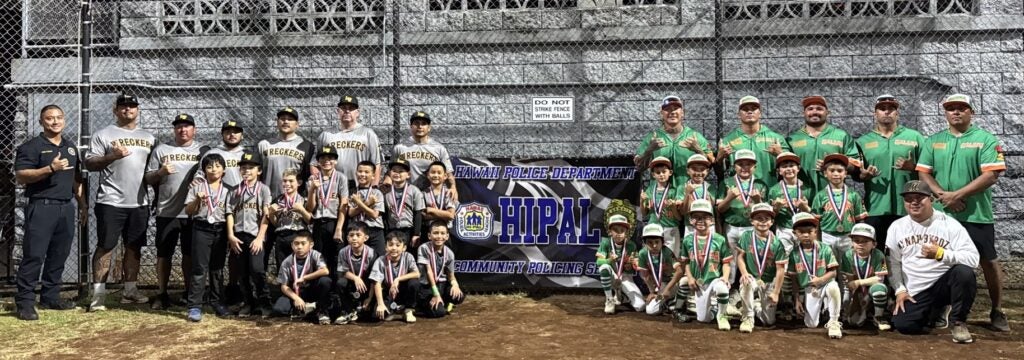 Two baseball teams from the HI-PAL Tee Ball/Coach Pitch Baseball Tournament.