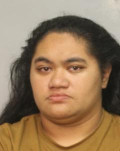 with picture of 23-year-old Alohi Kaupu-Grace of Hilo who police charged with various offenses stemming from an unauthorized transaction made with a victim’s credit card on Tuesday, April 15, 2025.