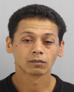 Picture of 33-year-old Kulike Ventura-Tampos who police charged with multiple offenses following his arrest in connection with stealing items from vehicles and attempting to steal a vehicle in the Kalopa area.