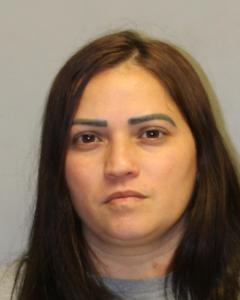 33-year-old Natrea Santiago of Hilo who police with multiple financial crimes after an investigation revealed more than $10,000 in unauthorized charges to the credit card of a 92-year-old m