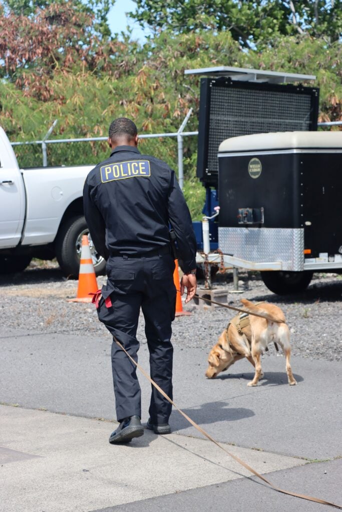 Officer Ross and K9 Trina doing a demonstration of the K9’s skills at as the boy and girl scout tour Kona Police Station.