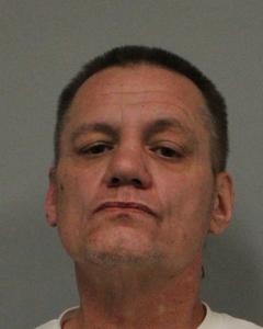 William Moore, age 51, charged with 18 drug and firearm offenses. 