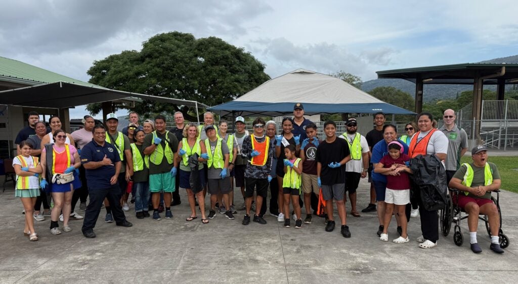 group photo of participants in Honaunau roadside clean up project.