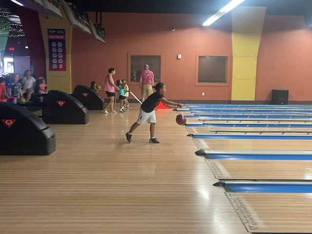 little kid bowling